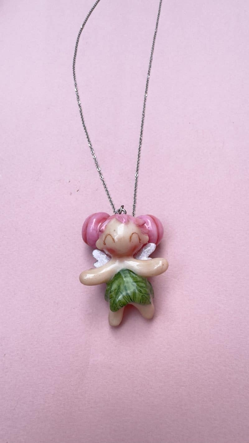 Colgante Hada moños rosas