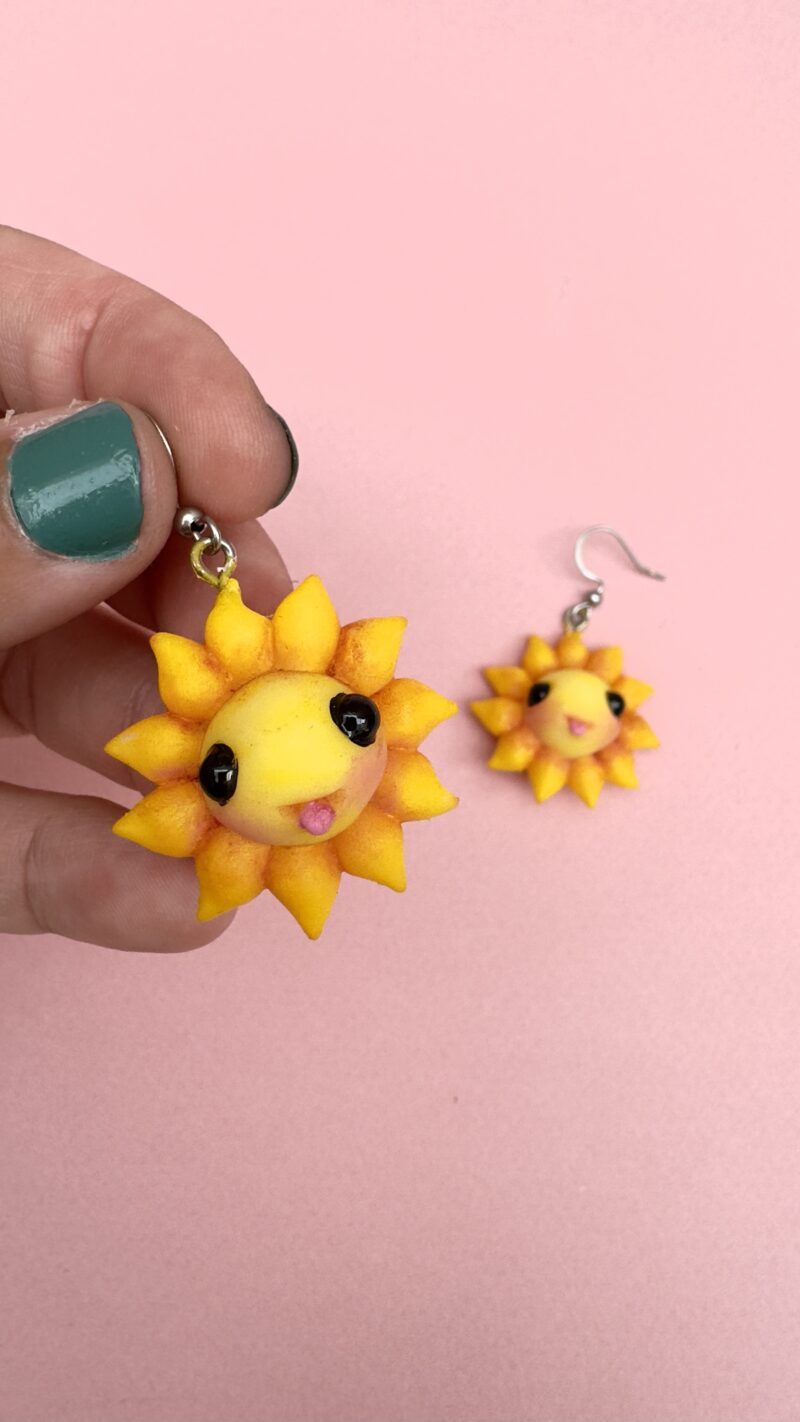 Pendientes soles felices